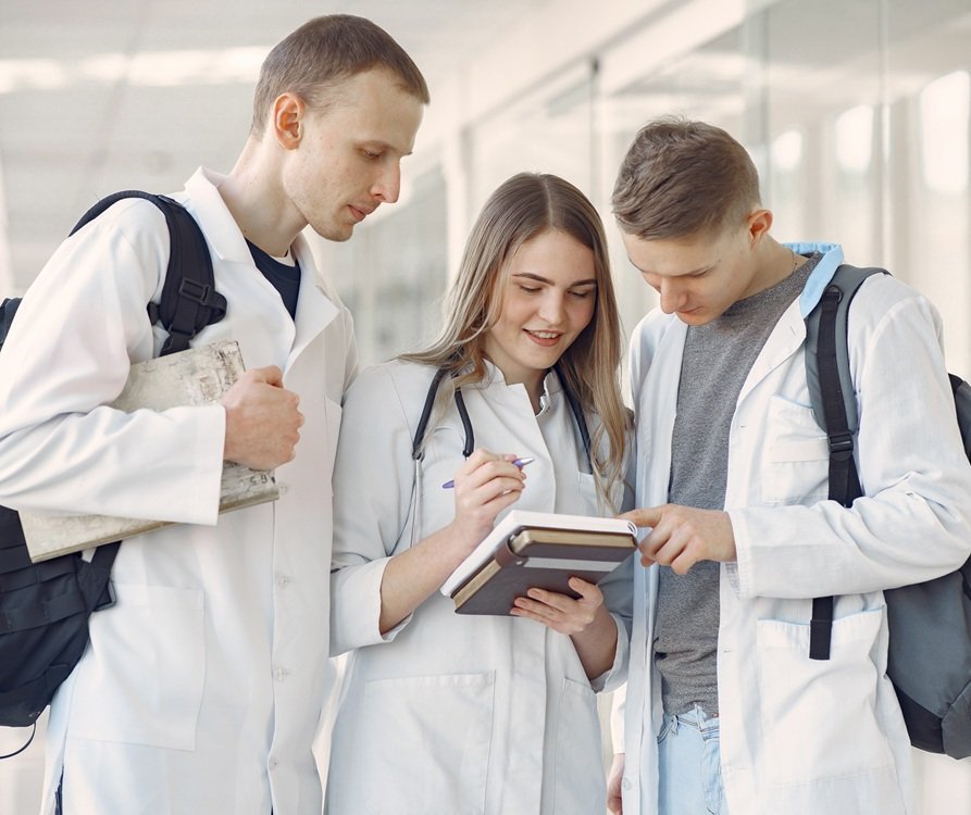 Medical students discussing notes